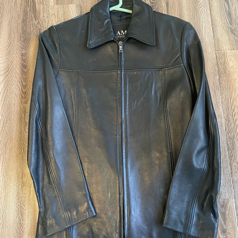 Used 100% black leather jacket in good condition.